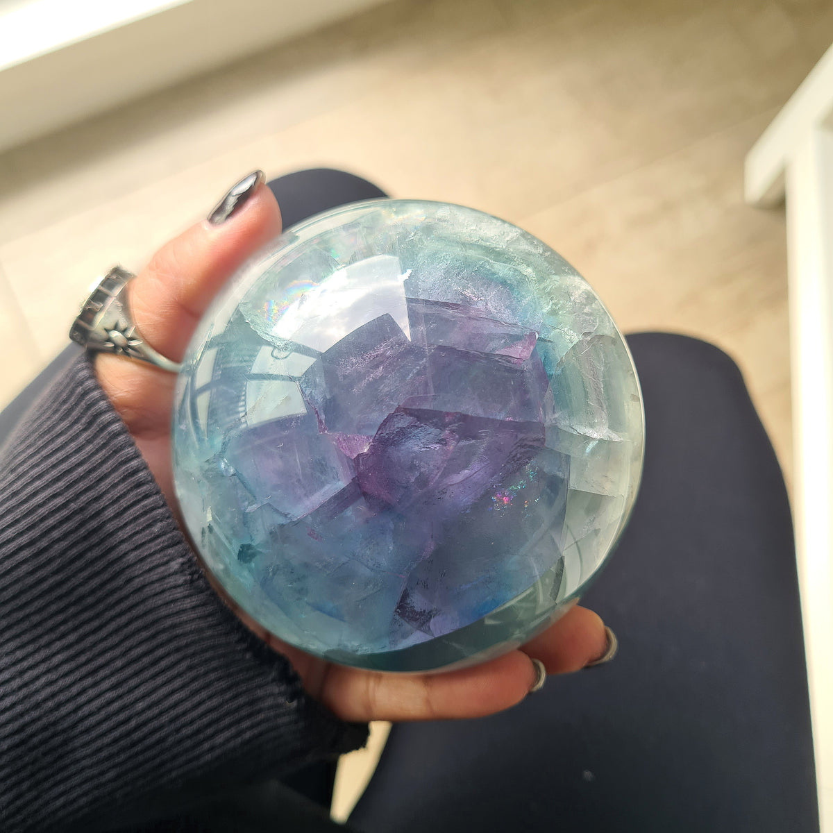 Rainbow Fluorite sphere, 8.5 cm, with green, blue and purple layers and natural internal formations.