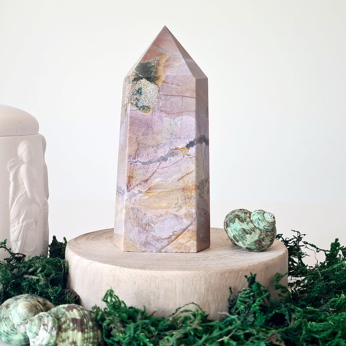 Ocean jasper tower 2 with pale lavender and cream bands and darker patches near its pointed tip.