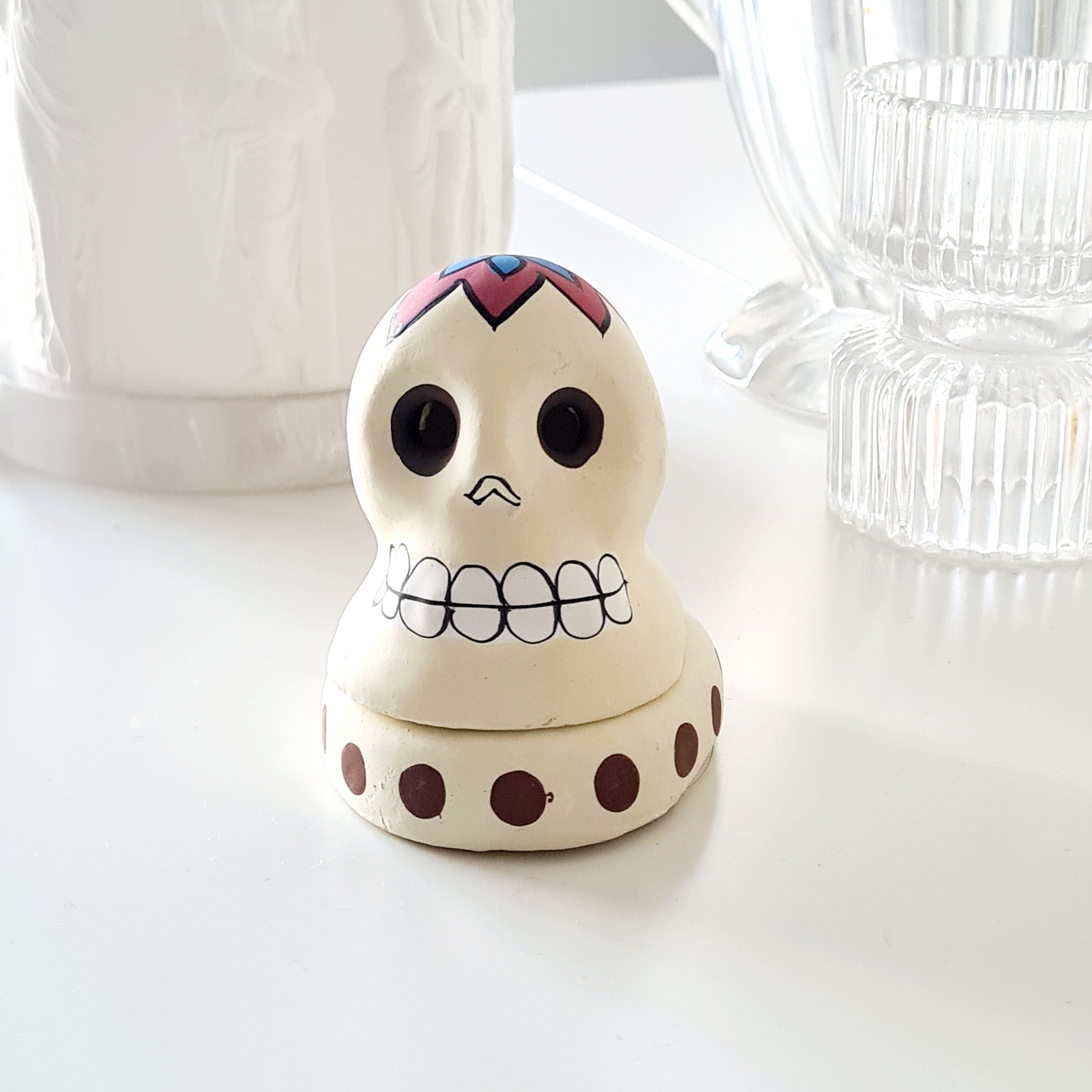 Terracotta Skull Incense Cone Burner – White Floral Design (3cm x 7cm)