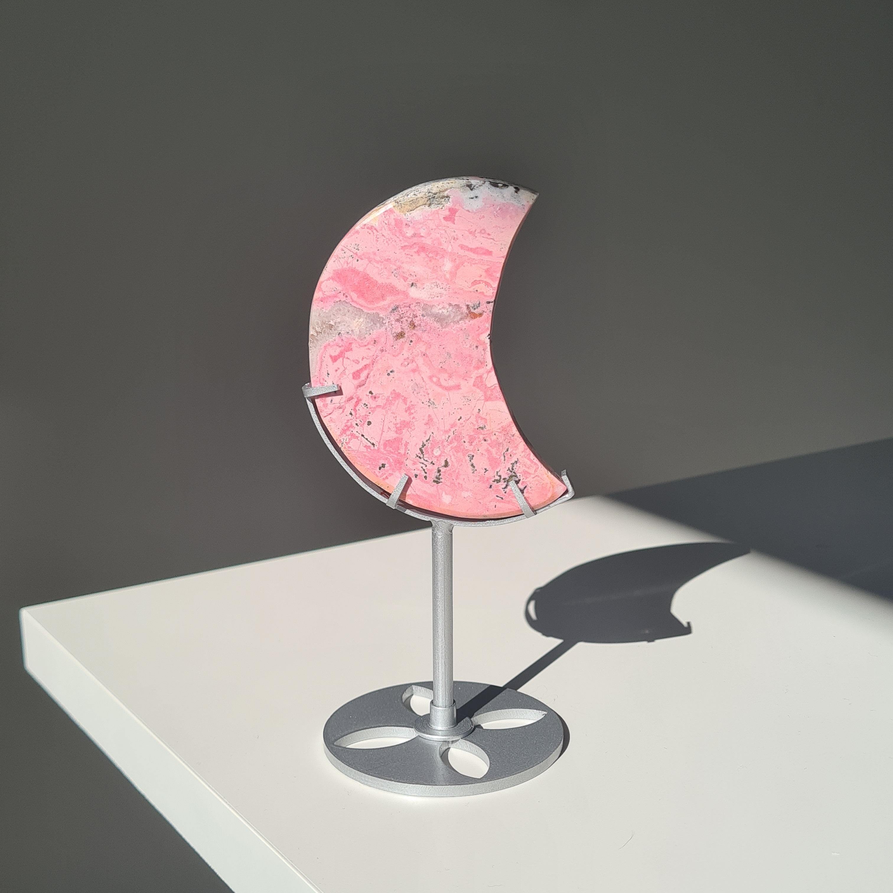 Peruvian Rhodonite Moon Carving On Stand | B | 9 cm Moon