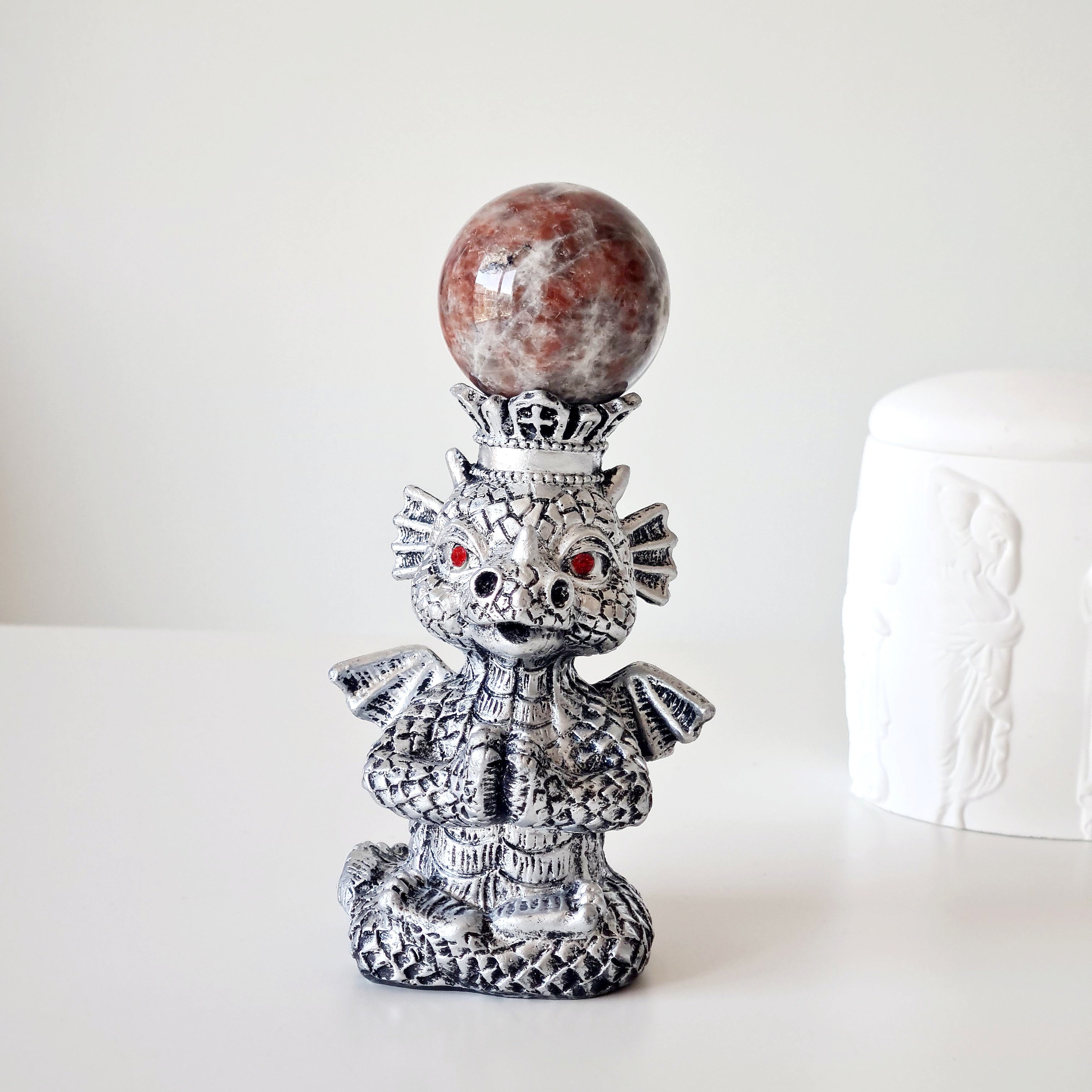 Sunstone peach Moonstone sphere on dragon stand