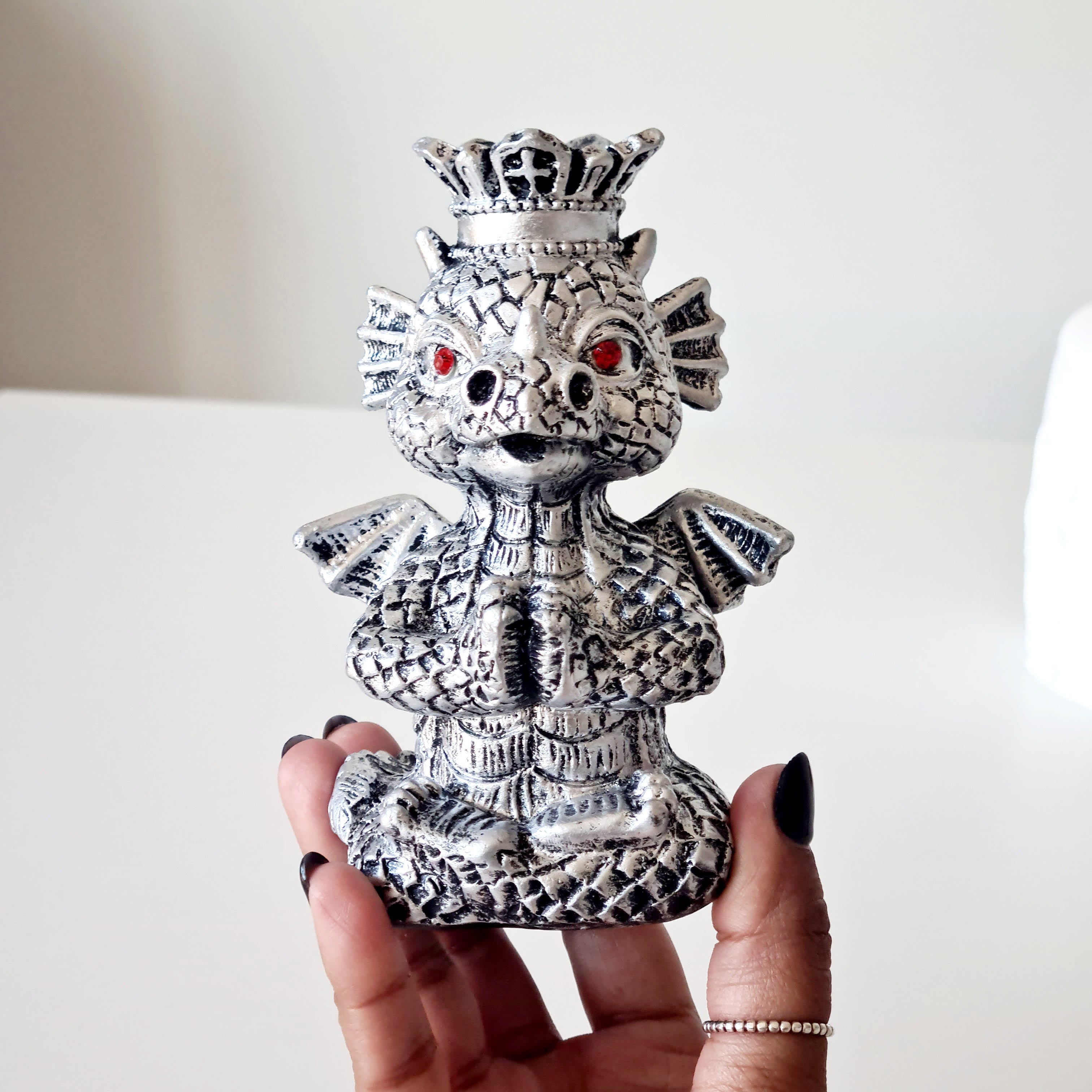 Sunstone peach Moonstone sphere on dragon stand