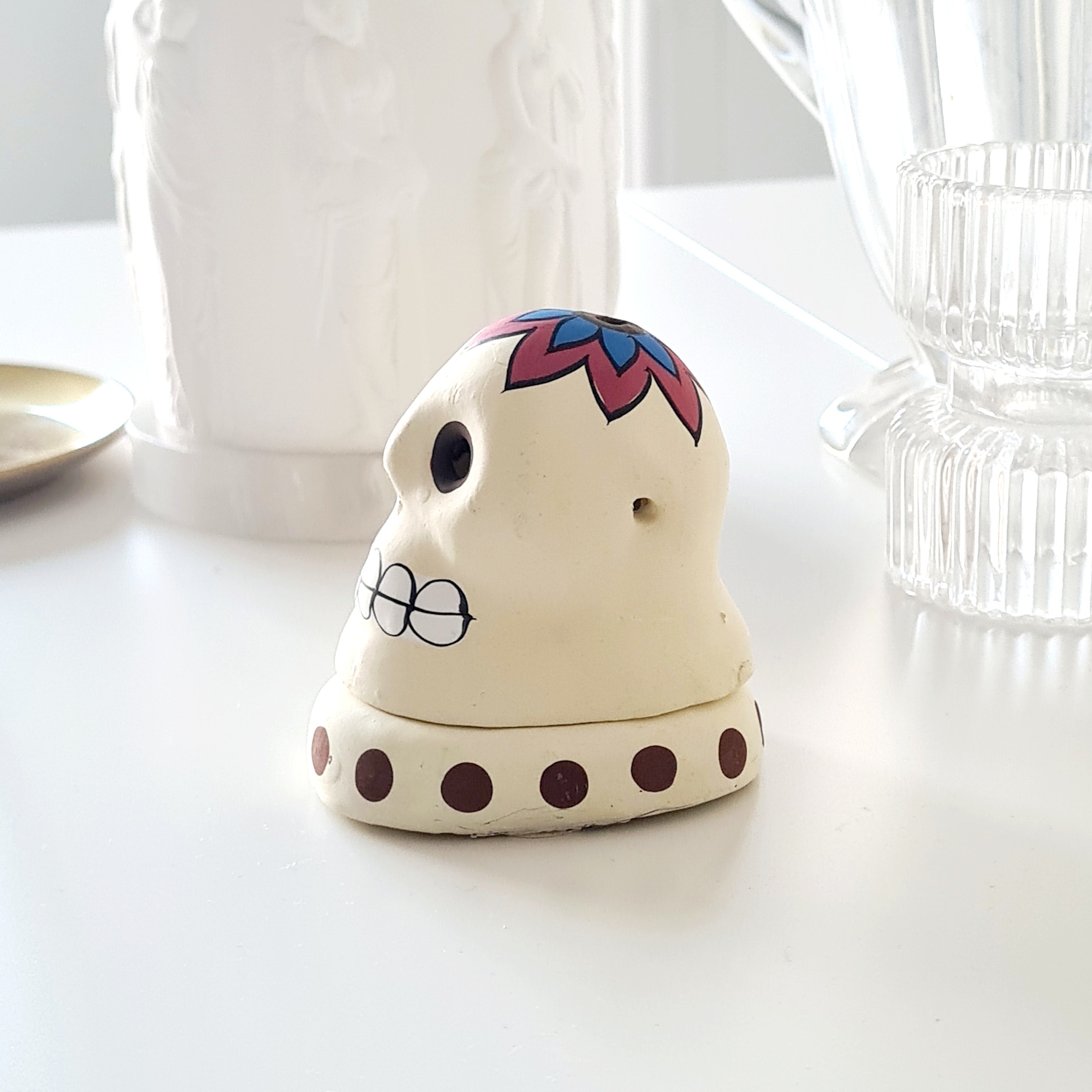Terracotta Skull Incense Cone Burner – White Floral Design (3cm x 7cm)
