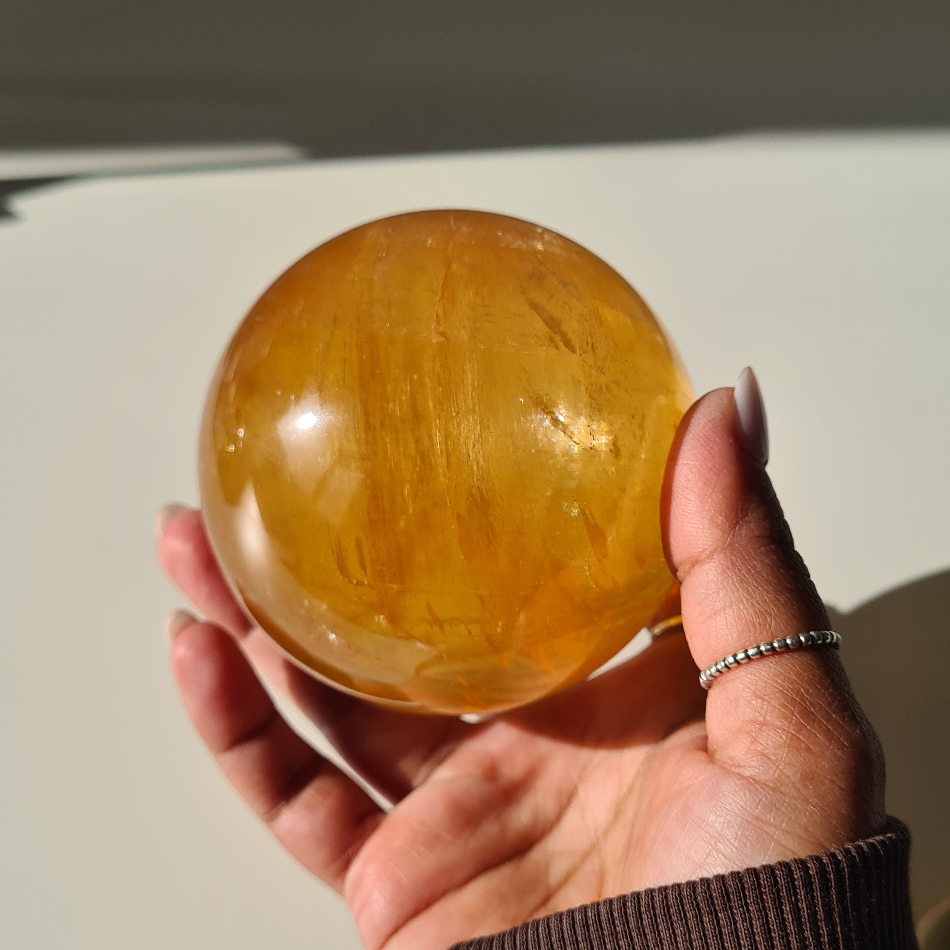 Ethereal Honey Calcite Sphere | B | 690 g | 7.7 cm