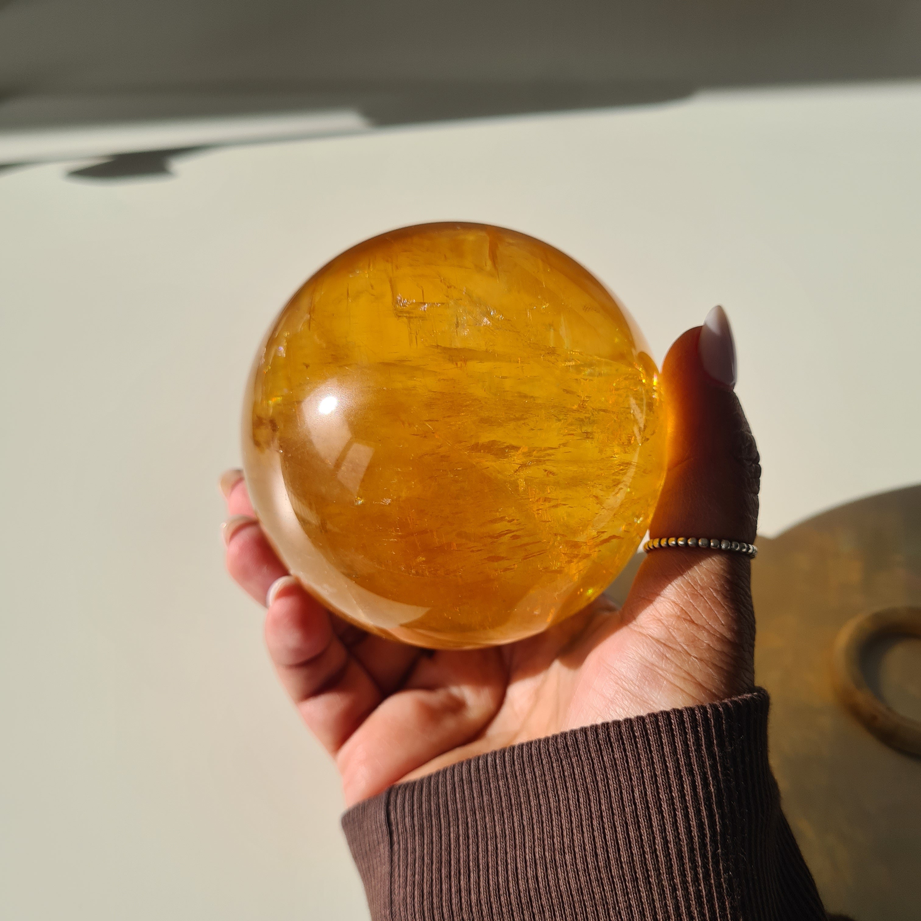 Ethereal Honey Calcite Sphere | B | 690 g | 7.7 cm