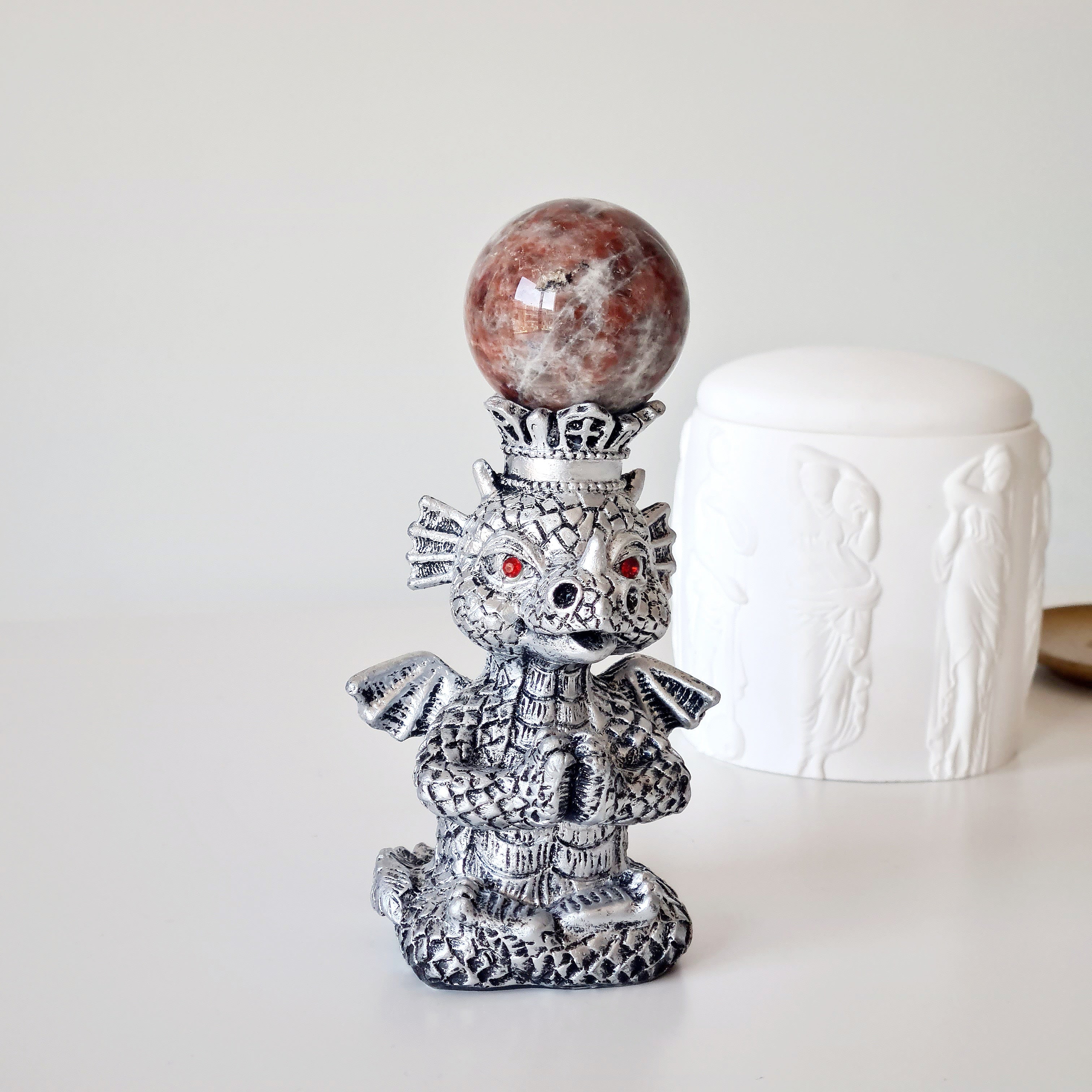 Sunstone peach Moonstone sphere on dragon stand