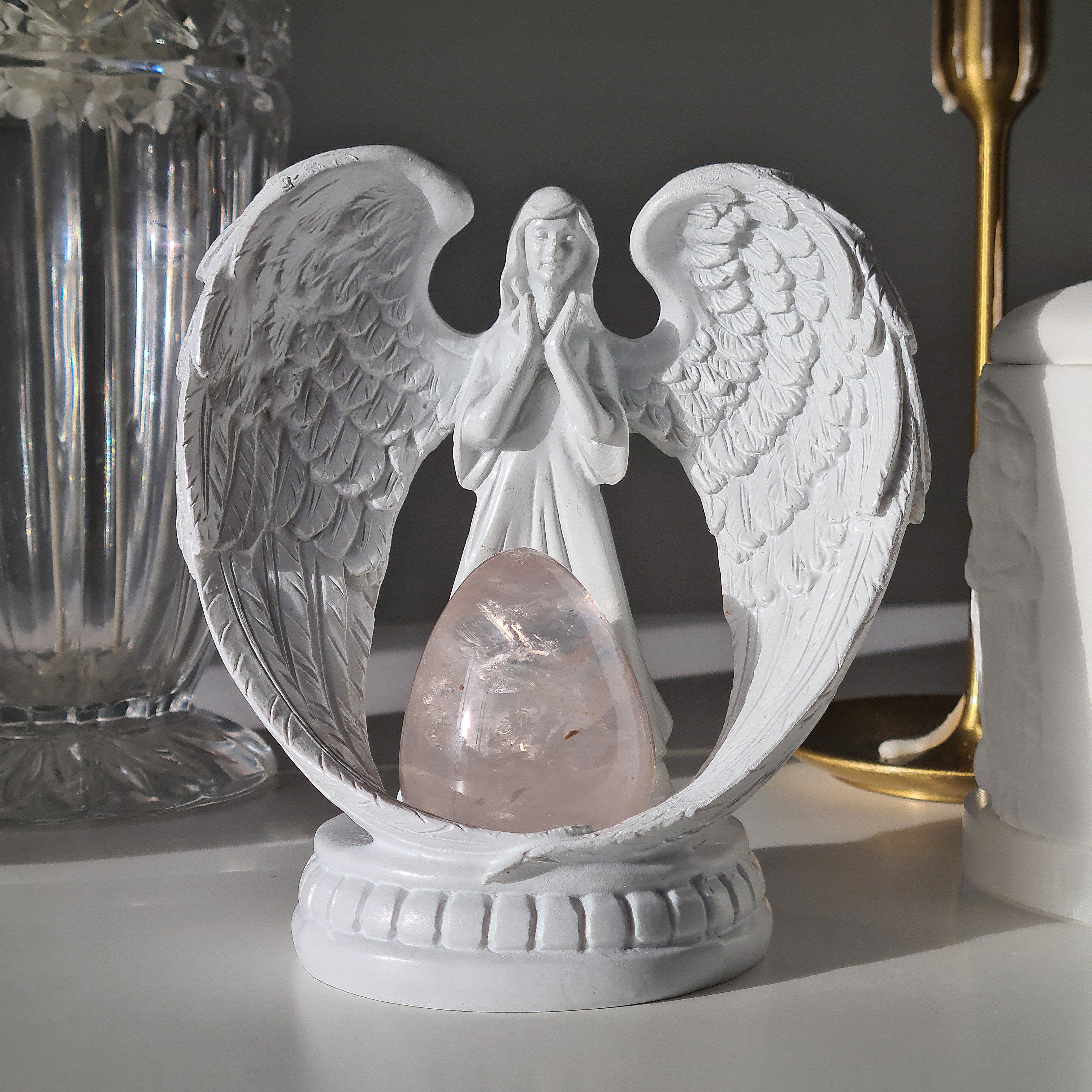 Icy rose quartz on guardian angel stand